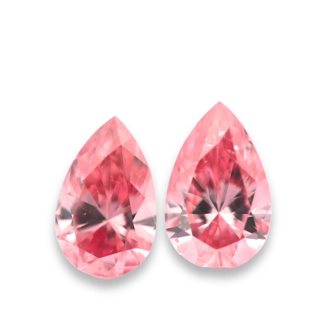 match pair of vivid pink argyle diamonds